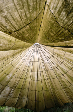 Close up of a large parachute as a big tent outdoors
