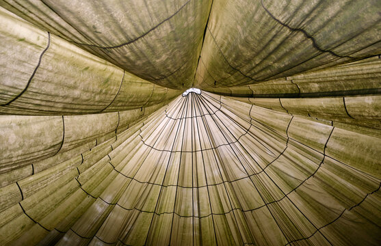 Close up of a large parachute as a big tent outdoors
