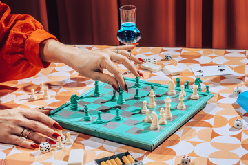 Female /Female Hands Playing Chess.