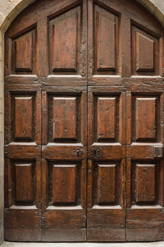 Old door on a street in Florence