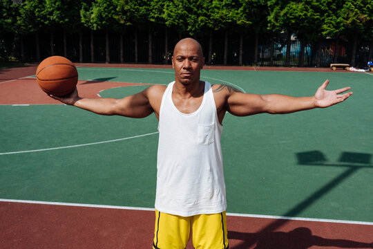 Black man on a basketball court