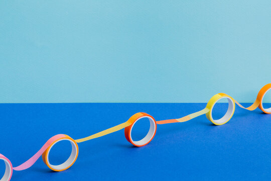 Five scotch tapes glued together on paper background