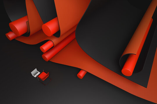 Laptop and chair next to an abstract background