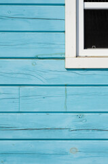 Light Blue Exterior Wall with White Window