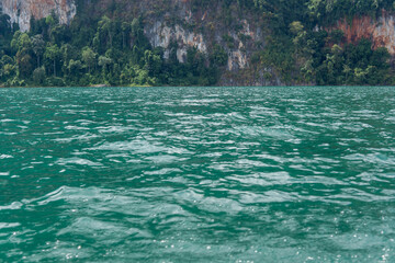 Blue sea and mountian with water surface background texture