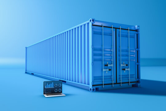 Cargo container next to a laptop