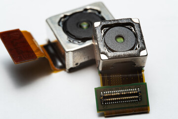 camera modules being used in mobile phones. development of mobile cameras. Digital camera lens...