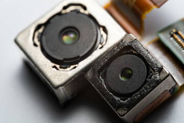 camera modules being used in mobile phones. development of mobile cameras. Digital camera lens...