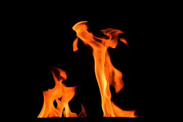Close up burning flames on black background for graphic design or wallpaper