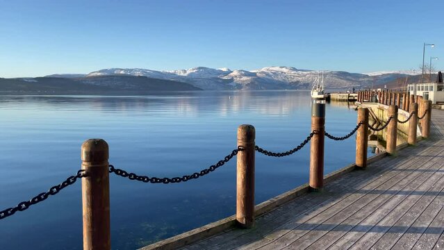 View from right to left over Fauske pier, Skjerstad fjord, saltdal, Northern Scandinavia, Bright sunny day.