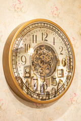 Fototapeta na wymiar antique clock face on the wall