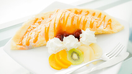 Cake decorated with fresh  on white background. Cafes in Phuket Thailand.