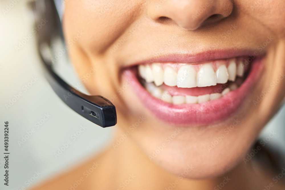 Aufkleber Big smiles when helping the customer. Closeup shot of an unrecognizable female customer support agent smiling in the office.