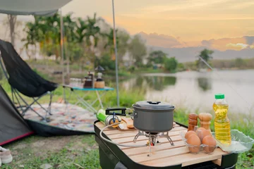 Foto op Plexiglas Cooking food during camping at natural park in Thailand. Recreation and journey outdoor activity lifestyle. © graphixchon