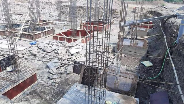Pile cap and column stump under construction at the construction site. Constructed using reinforced concrete with plywood timber as a formwork - PCC footing for raft slab