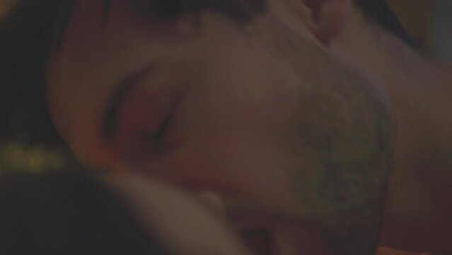 the guy with admiration tenderly looks at his beloved and kisses her without stopping