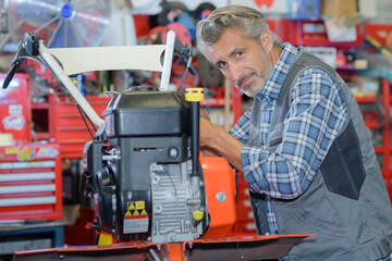 Fototapeta premium production machine operator looking at the camera