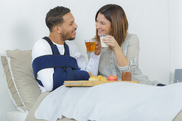 wife taking care of the injured husband