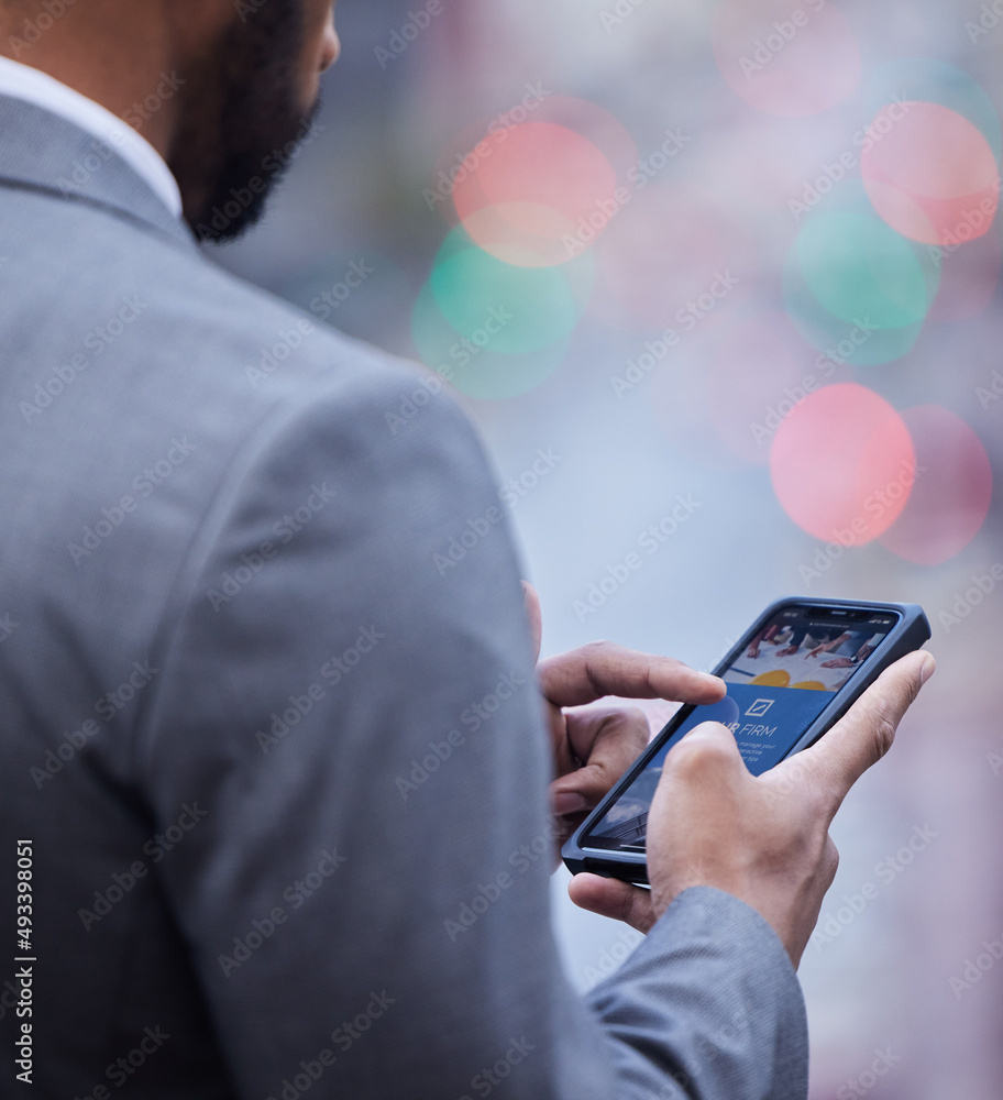 Poster the company website is coming along well. cropped shot of an unrecognisable businessman standing alo