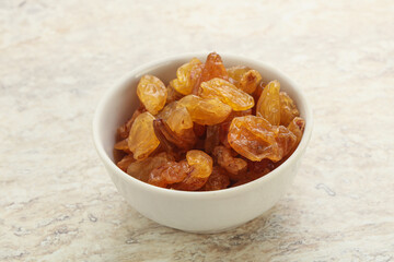Sweet yellow raisin in the bowl