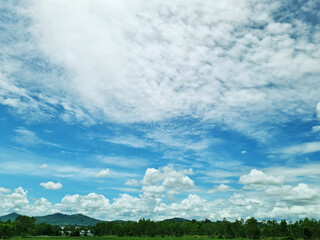 Countryside sky and mountains, wonderful spring landscape. Lawns and hills, rural scenery.