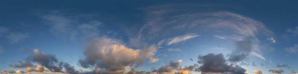 Dark blue sunset sky panorama with Cumulus clouds. Seamless hdr pano in spherical equirectangular format. Complete zenith for 3D visualization, game and sky replacement for aerial drone 360 panoramas.
