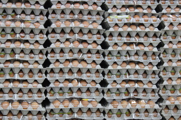 Egg cartons stacked in grocery warehouse