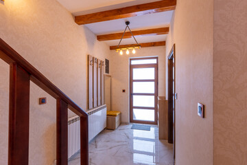 Apartment interior, entrance corridor with wooden doors
