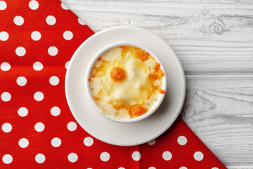 Mushroom juliene in bowl on wooden background