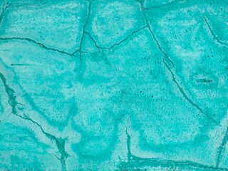 The concrete floor has cracks that are beautiful and unique.