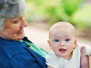 Little boys are just superheroes in disguise. Cropped shot of a baby boy spending time outdoors with his grandmother.