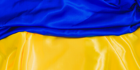Yellow Blue cloth silk texture, concept of details. Ukrainian flag  