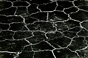 Natural  black marble texture with white cracked seamless patterns on ground background