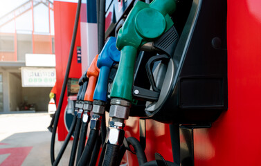 Petrol pump filling fuel nozzle in gas station. Fuel dispenser. Refuel fill up with petrol...