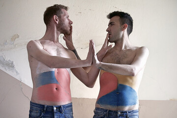 Gay couple - antiwar body paint