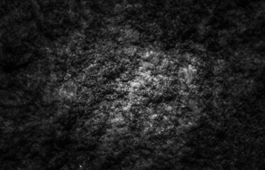 Dark textured stone background. The texture of the stone.