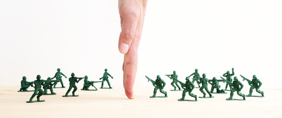 image of toy soldiers over wooden table