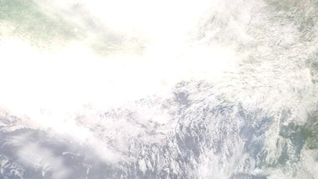 Earth zoom in from outer space to city. Zooming on Ashaiman, Tema, Ghana. The animation continues by zoom out through clouds and atmosphere into space. Images from NASA