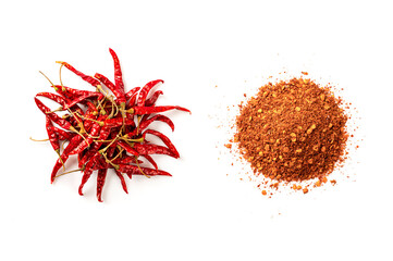 Naklejka premium Red hot chili peppers with chili powder isolated on white background. Top view 