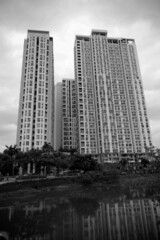 Obraz premium High rise residential building at the river in HCMC city