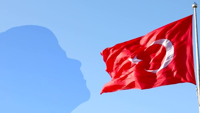 April 23 children's day or 23 nisan cocuk bayrami 4k video. Turkish flag waving with a silhouette of a child.