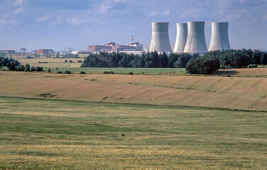 Fototapeta na wymiar Nuclear plant and cornfields. Panorama. Czech Republic. Cooling towers. 