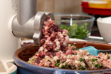 process of preparing forcemeat by means of meat grinder