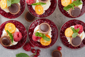 Panna cotta dessert with raspberry and mint