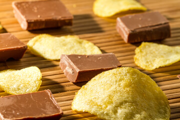 Chunks of milk chocolate and potato chips