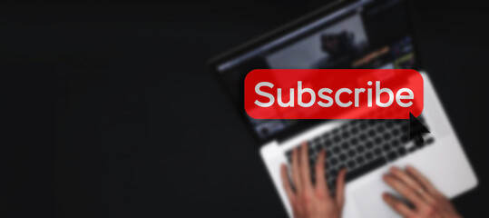 Subscription service. Online video red subscribe button. Internet service on laptop digital tablet blured banner background. Streaming video. Communication network.