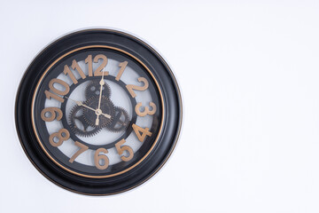 clock on the wall on a white background with space to the right 