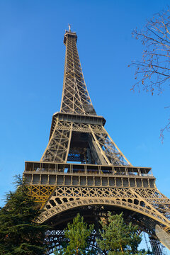 Eiffel Tower from Paris, photographed during a cloudy day from the spring of 2022, landmark in France.