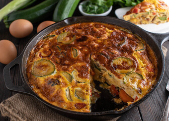 Frittata with vegetables. Ovenbaked and homemade cooked