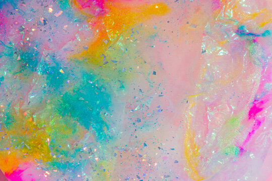Rainbow marble texture background with glitter